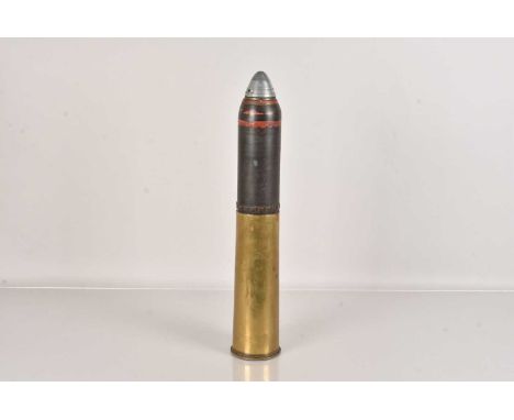 A WWI Period 18 Pound Shell, having projectile and shell, the projectile stamped 'O.F 18 PR 1 FS VSM 3/1/06', complete with t