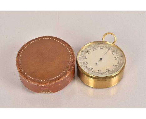 An Air Ministry Pocket Aneroid Barometer, Mark I, by T.Wheeler, London, No.135, R/2284, silver dial, brass case, complete wit