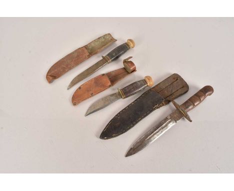 A WWII Trench knife, marked Mk.I.42 M.I.L,  the scabbard marked 41, together with two hunting knives (3) no postage for this 