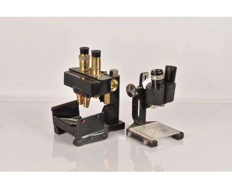 A Low Power Binocular Microscope by W.Watson & Sons Ltd of London, serial 51497, together with a Cooke, Thoughton & Simms Ltd