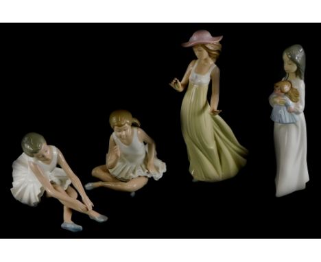 A collection of Nao porcelain figurines, to include two ballerinas, figure of a lady in a flowing dress, and a young child ho