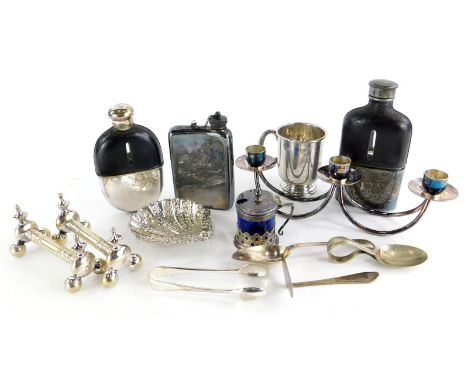 A collection of silver plated items, to include various hip flasks, knife rests, sugar tongs, shell shaped dish, spoon and pu