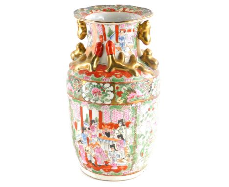 A Chinese porcelain Canton style vase, decorated with gilt handles, lizard figures, etc., an overall enamel decoration of fig