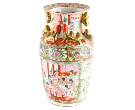 A Chinese porcelain Canton style vase, decorated with gilt handles, lizard figures, etc., an overall enamel decoration of fig