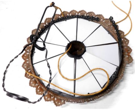 A cast iron ceiling light fitting, decorated with pierced borders, leaves, acanthus, etc., with a black painted gallery, fitt