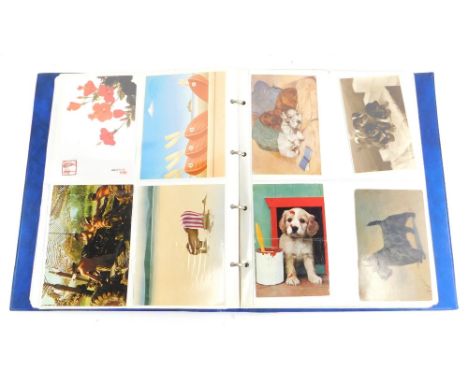 An album of various vintage and other postcards, to include motoring interest, dogs, vintage telephones, etc.