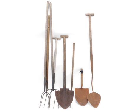 A collection of 19thC/early 20thC and later rustic tools, to include hay forks, shovels, etc. (AF)