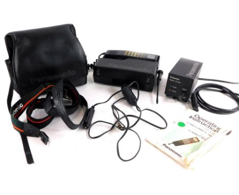 An early Panasonic vintage mobile telephone, with carrying case and charger.