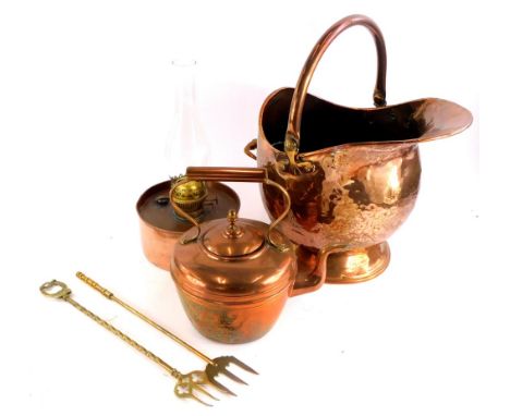 A copper coal scuttle, with swing handle, a paraffin lamp, copper kettle, etc.