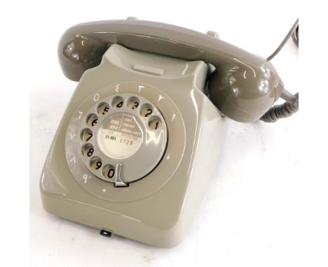 A 1984 vintage GPO/BT two tone dolphin grey telephone, with Arabic dial surround.