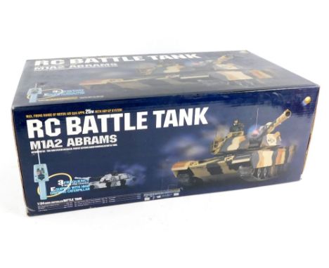 A remote control model of a RC battle tank, 1/24 scale radio controlled, with automatic electric gun system installer, etc., 