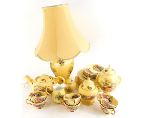 A collection of Aynsley Orchard Gold ceramics, to include lamp base, vase and cover, teapot, etc.