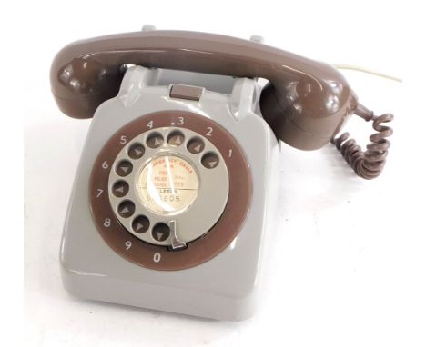 A 1966 vintage GPO 706 two tone grey telephone, with bell on/off button.