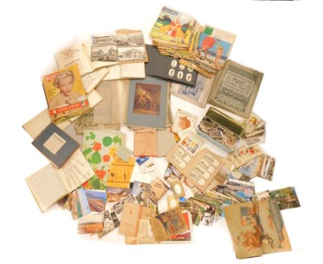 A quantity of ephemera, to include postcards, cigarette cards, playing cards, school books, biology books, etc.