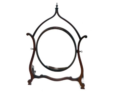 A mahogany dressing table mirror, in Chinese Chippendale style with a shaped frame, oval plate, 78cm high.
