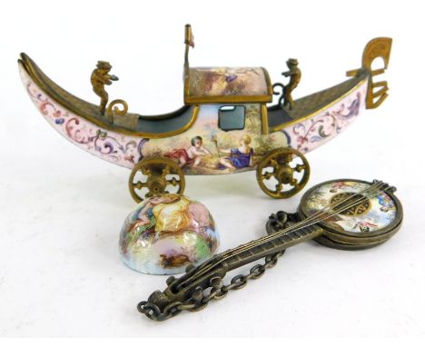 A continental enamel model of a gondola on wheels, with gilt metal mounts, 10cm wide, a similar mandolin, etc., (AF).