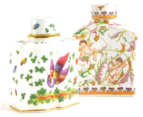 A continental porcelain tea caddy and cover, of shaped form, decorated with Asiatic pheasant, flowers, leaves, etc., 12cm hig