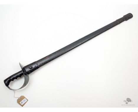 A GOOD CONDITION NAVAL BOARDING CUTLASS IN ITS LEATHER SCABBARD.
We offer in-house international shipping for all items - you