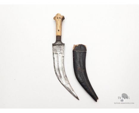 A NORTH INDIAN TIGER TOOTH DAGGER IN ITS LEATHER SCABBARD (1)
We offer in-house international shipping for all items - you wi