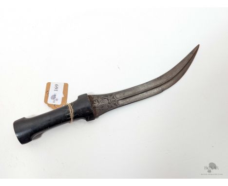 AN INDO-PERSIAN KHANJAR DAGGER, DECORATED WITH HUNTING SCENES, WOOTZ DAMASCUS WATERED STEEL BLADE.
We offer in-house internat