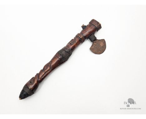 AN AFRICAN TRIBAL AXE, CARVED WOODEN SHAFT
&nbsp;
We offer in-house international shipping for all items - you will receive a