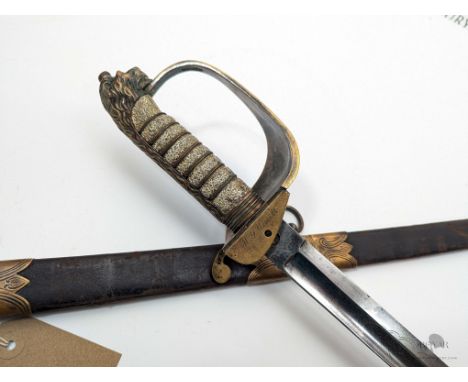 A NAMED VICTORIAN ROYAL NAVY OFFICER'S SWORD, RETAILED BY J. GIEVE &amp; SONS PORTSMOUTH (1901-1904). PROOF DISC TYPICAL OF W