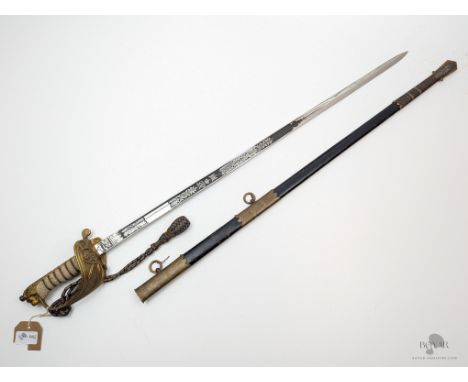 A NAMED GEORGE VI ROYAL NAVY OFFICER'S SWORD, WITH A TOP QUALITY SHARP ETCH, MANUFACTURED AND RETAILED BY WILKINSON. NAMED TO