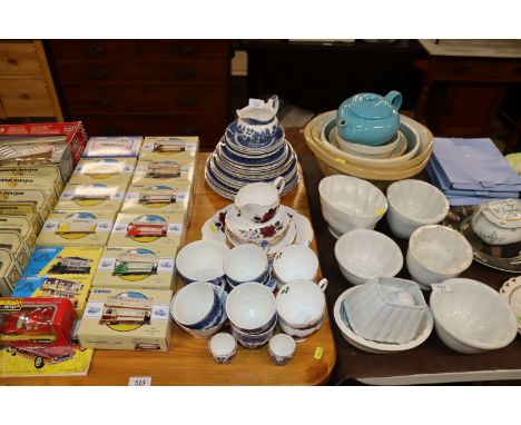 A quantity of willow blue and white dinnerware, Colclough tea ware etc.
