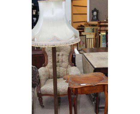 MAHOGANY STANDARD LAMP
with fluted column, over a stepped square base; together with a carved mahogany sewing table (2)