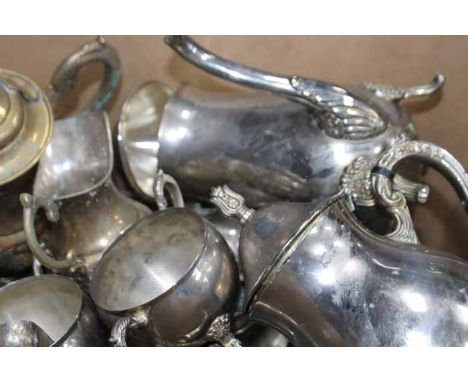 LOT OF SILVER PLATED ITEMS
including a tea set, teapot, a brass tea set, a a comport, teaspoons etc.