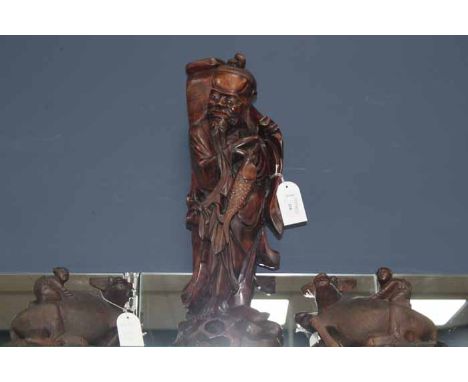 CHINESE CARVED WOODEN TABLE LAMP
together with a pair of buffalo figures (3)
