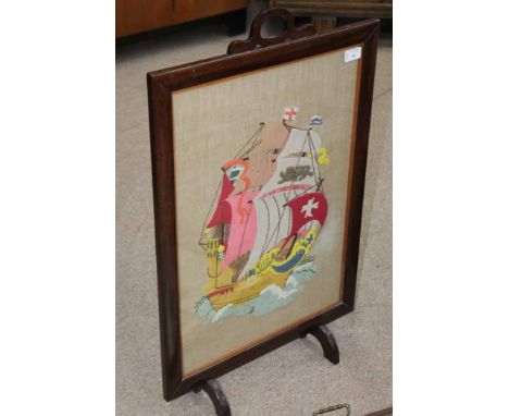 MAHOGANY FRAMED FIRESCREEN
depicting a gallion, 76cm high; together with a similar two-handled tray, 67cm long (2)