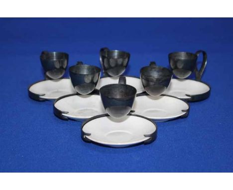 SIX COALPORT EGG HOLDERS AND SAUCERS
in the form of a chamber stick