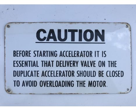 A small rectangular enamel sign - 'Caution before starting accelerator....' 16 x 9".