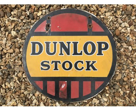 A Dunlop Stock circular double sided enamel sign, 18" diameter.