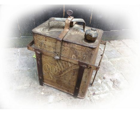 A Redline two gallon petrol can with cradle bracket for attaching to a running board.