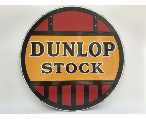 A Dunlop Stock circular double sided enamel sign, in near mint condition, 18" diameter.