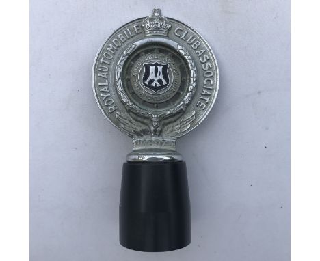 A Royal Automobile Club Associate car badge with the Automobile Association of Auckland centre, stamped N16979.