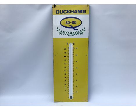 A Duckhams 20-50 enamel thermometer by Burnham, lacking tube, with three retouched corners, 13 x 36".