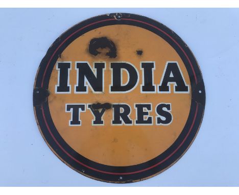 An India Tyres circular enamel sign, 18" diameter.
