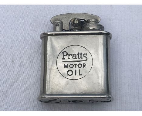 A Pratts Motor Oil lighter. 