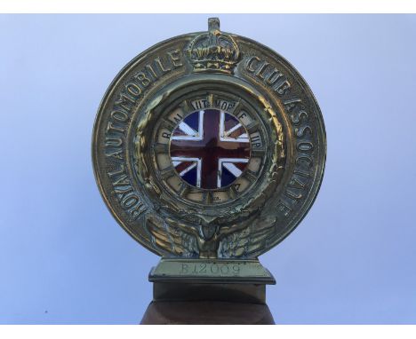 A Royal Automobile Club Associate car badge with good Union Jack enamel centre stamped B12009, with original 1931 date backin