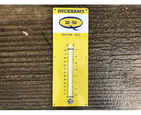 A Duckham's 20-50 Motor Oil enamel thermometer, in good condition, lacking tube, 13 x 36".