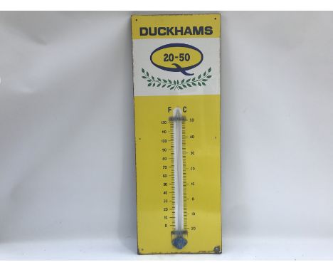 A Duckhams 20-50 enamel thermometer by Burnham of London with laurel wreath motif, the sign in excellent condition, 13 x 36".