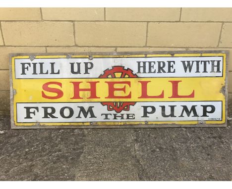 An early Shell 'Fill up here with Shell from the pump' rectangular enamel sign with some retouching, mounted on a board, 55 1