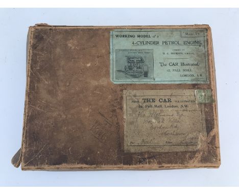 The Car Illustrated - a box containing six moveable brass and cardboard sectioned cards explaining how a four cylinder circa 