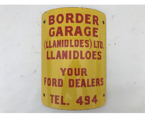 A Border Garage (Llanidloes) Limited Ford Dealership curved enamel sign in good condition, 8 3/4 x 12".
