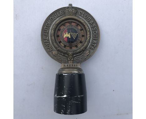A Royal Automobile Club Associate car badge with Devon and Cornwall Automobile Club part enamel centre and celluloid backing,