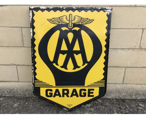 A pair of AA Garage enamel signs by Franco set within a metal frame, 22 1/2 x 31".