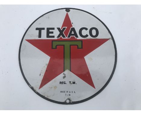 A small circular Texaco enamel sign, dated January 1931, made in the USA, 8" diameter. 